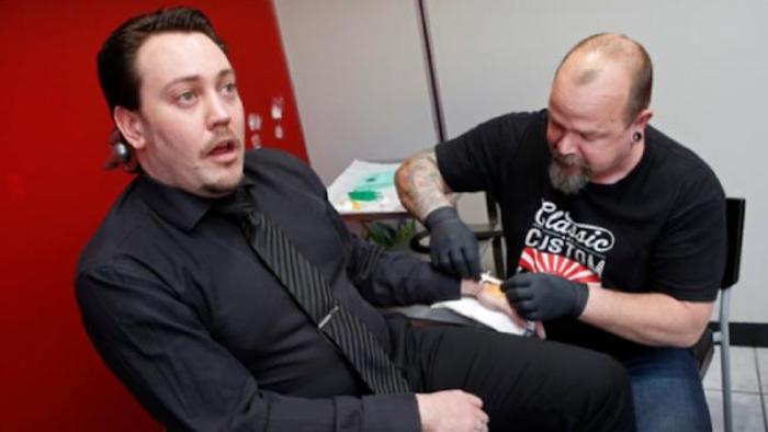 Swedish companies have begun implanting microchips under employees' skin, with workers accepting the implants because they are "fashionable."