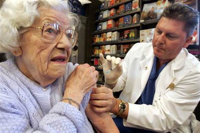 Flu vaccine is completely ineffective on elderly people over 65 years old