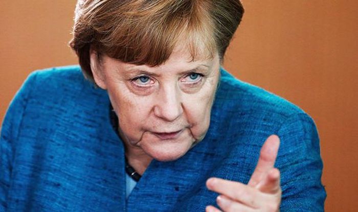 Angela Merkel blasts Trump over his Mexico wall plans