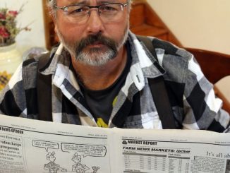 Monsanto forced an Iowa newspaper to fire a cartoonist after he dared to criticize the salary of their CEO.
