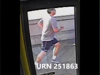 A millionaire Wall Street banker has been arrested after a woman was intentionally pushed in front of a bus in London.