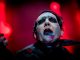 Rock star Marilyn Manson has been hospitalized after a stage prop fell on him, damaging his left leg and crushing both testicles, during a New York show on Saturday.