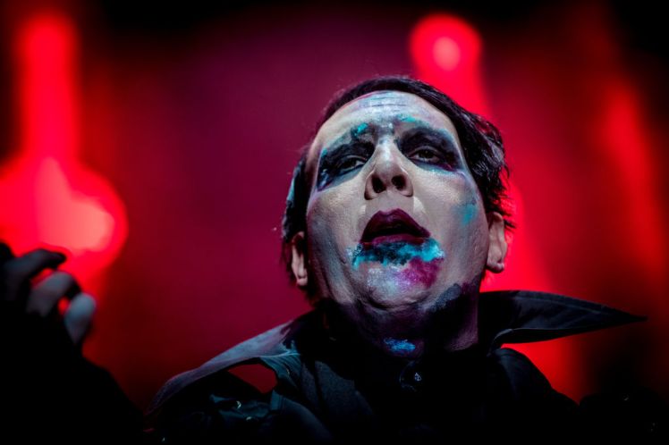 Rock star Marilyn Manson has been hospitalized after a stage prop fell on him, damaging his left leg and crushing both testicles, during a New York show on Saturday.