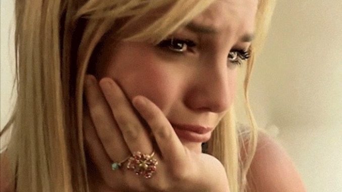Britney Spears has told close friends that she prays to God every night asking him to forgive her for associating with the Illuminati.