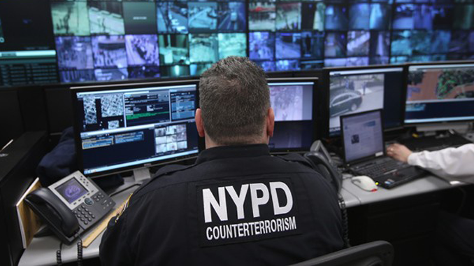 US police officers using military equipment to spy on innocent citizens