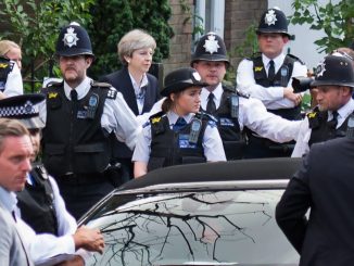 Theresa May's government in collapse after huge porn raid