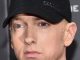 Eminem says he is so "embarrassed" being white that its making him want to commit suicide because he "can't escape" his own race.