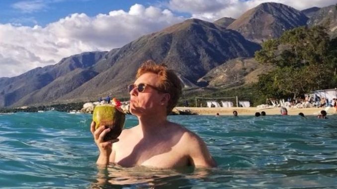 A member of Conan O'Brien's production crew was mugged in Haiti while the talk show host was filming a show designed to prove Haiti is safe.