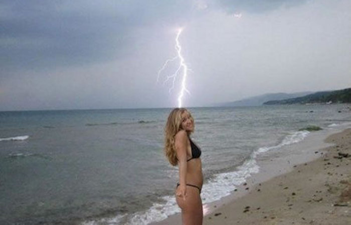 A woman has suffered severe burning to her anus after being struck by lightning bolt which hit her in the mouth and passed right through her body, exiting in the from of sparks from her ass.