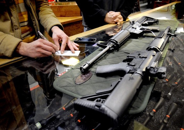 Democrats are urging banks and credit card companies to block customers from purchasing firearms