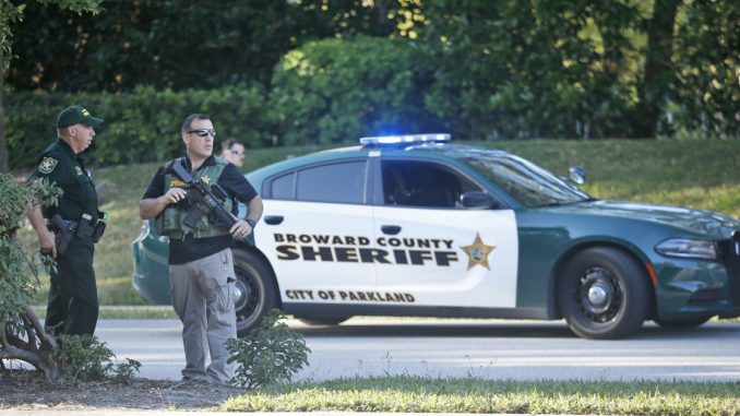 Four armed police officers from Broward County Police may have been ordered to stand down from intervening in the Parkland school shooting, according to reports. 