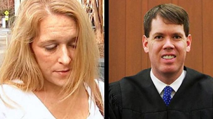 A North Carolina judge has thrown a mother in jail for 7 days for having her daughter baptized without gaining permission from the father.