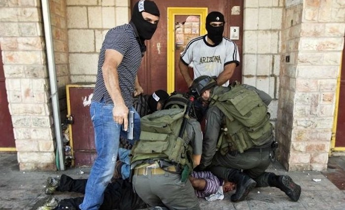 Israeli police disguised as journalists abduct and shoot at Palestinian students