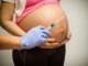 Merck pay pregnant mothers to accept experimental vaccine that could induce abortion as side-effect