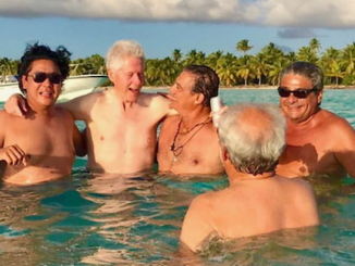 Robert Mueller's star witness in Trump Russia probe caught partying with Bill Clinton