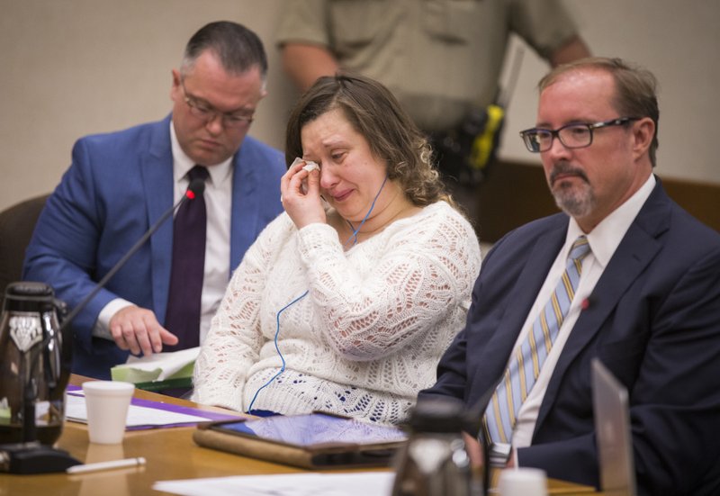 A childcare worker who hung a child from a homemade noose has been granted probation by a judge, who declared her "low risk."