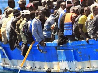 The Italian government rescued the crew of a private ship that saved 67 migrants from drowning after the migrants threatened to behead them.