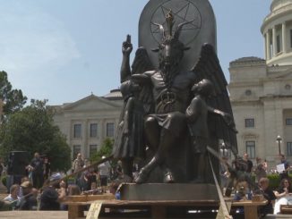 A giant goat-like statue of Baphomet was unveiled Thursday on the lawn of the Arkansas State Capitol in Little Rock in front of a baying media pack and supporters who chanted "Hail Satan."   