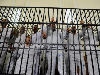 A Muslim cleric was deported from Italy after prison officials caught him celebrating the death of "infidels" in a jihadi terror attack. 