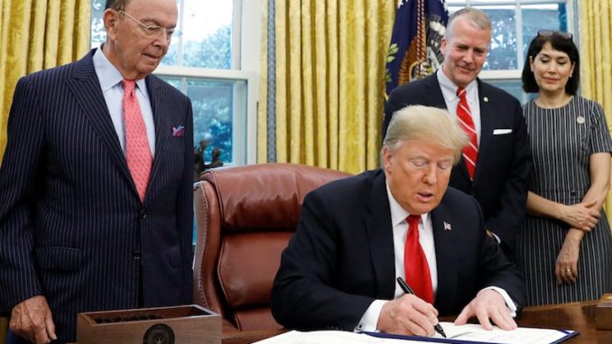 President Trump has signed a landmark new bill to introduce legislation that will clean millions of tons of garbage from the world's oceans.