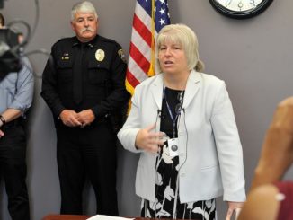 A split grand jury decided it would not bring charges against an Eagle Point, Oregon police officer who fatally shot a jaywalker in the back after following him into a restaurant bathroom. 