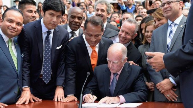 California Gov. Jerry Brown has issued a revised budget that allocates $33 million to help defend illegal immigrants against deportation.