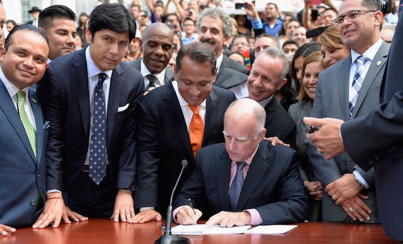 California Gov. Jerry Brown has issued a revised budget that allocates $33 million to help defend illegal immigrants against deportation.