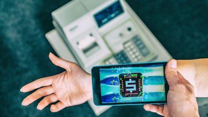 Cash becomes extinct in Sweden as citizens use implanted microchips to pay for goods and services