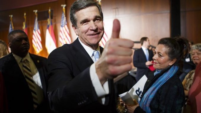 Democratic Gov Roy Cooper vetoes voter ID bill