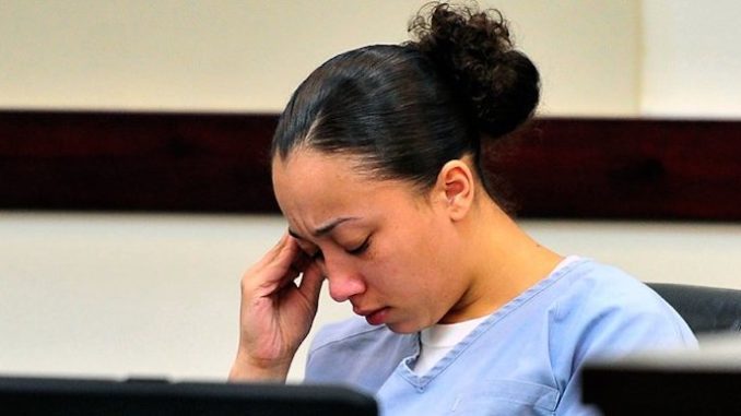 The Tennessee Supreme Court has ruled that a woman who killed a man in self-defense when she was a child sex slave must serve more than 50 years in prison before she is eligible for parole.