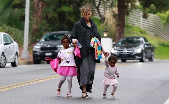 South African actress Charlize Theron says she is considering leaving the United States of America because of the Trump administration.