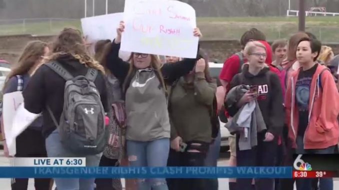 Teen girls stage walkout over school policy to allow boys who claim to be 'girls' to use their bathroom