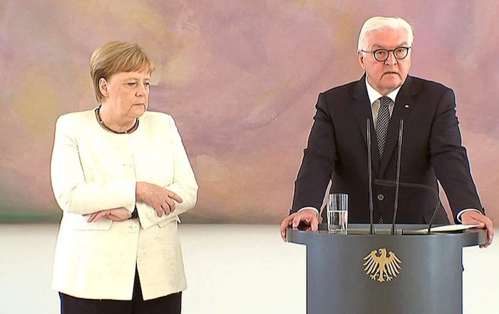 German Chancellor Angela Merkel caught violently shaking during ceremony