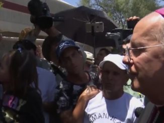 Catholic bishop escorts migrants over US border