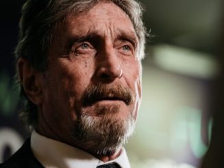 John McAfee has threatened to release files that expose corruption in Washington D.C. if the federal government continue harrassing him.