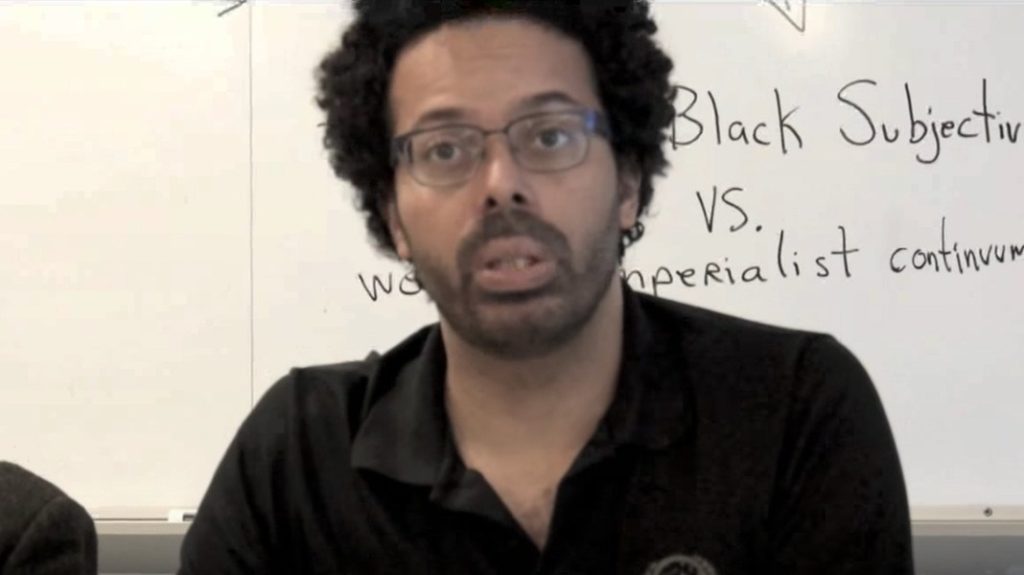 A State University of New York literature professor says it makes him happy when he sees poor white people begging on the streets.