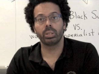 A State University of New York literature professor says it makes him happy when he sees poor white people begging on the streets.