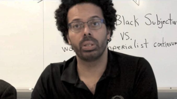 A State University of New York literature professor says it makes him happy when he sees poor white people begging on the streets.