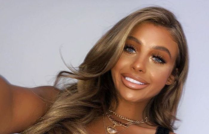 A fashion blogger with tan skin has been accused of being racist after internet commenters suggested her love of tanning is "modern blackface"