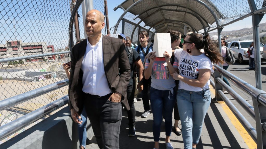 Sen. Cory Booker escorts asylum seekers across U.S. border