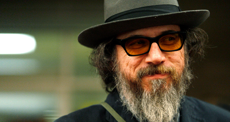 Hollywood director Larry Charles took to Twitter Monday and urged leftists and liberals to arm themselves for "war" against "Maga people." ﻿