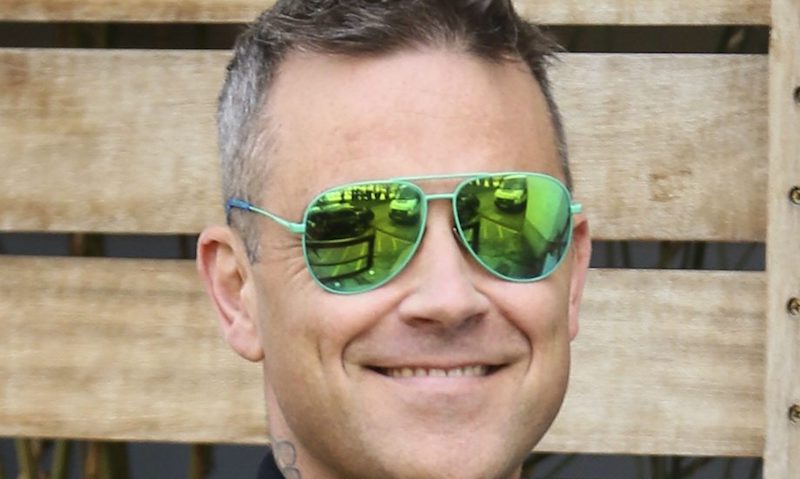 Robbie Williams installs 24-hour security at his home over fears aliens might contact him