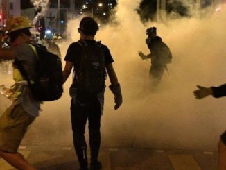 Hong Kong police fire warning shots at protestors