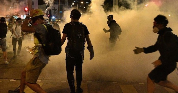 Hong Kong police fire warning shots at protestors