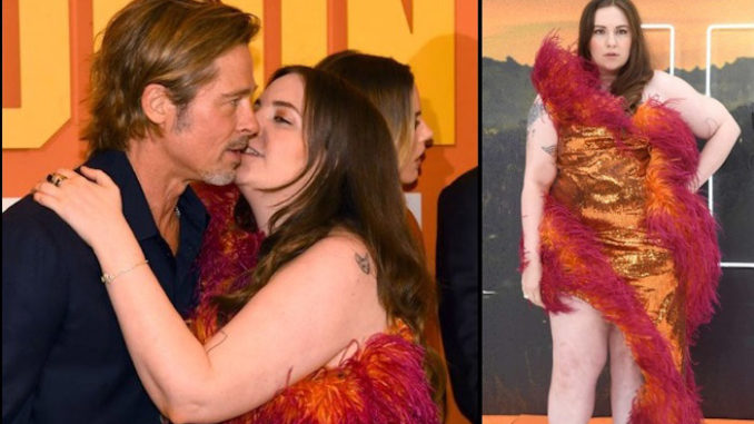 Lena Dunham is under fire for what many media members are saying is her awkward attempt to kiss Brad Pitt on the lips.