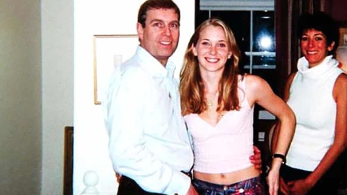 Jeffrey Epstein's child sex slave denies claims that photo with Prince Andrew was faked