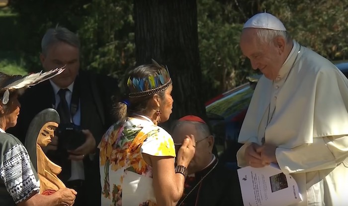 Pope Francis hosted a global warming themed event that included dozens of people literally bowing down before a carved pagan idol inside the Vatican walls.