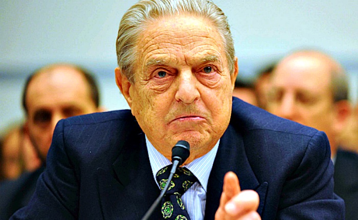 Billionaire George Soros has warned President Trump he is "digging his own grave" as impeachment proceedings continue in US Congress.