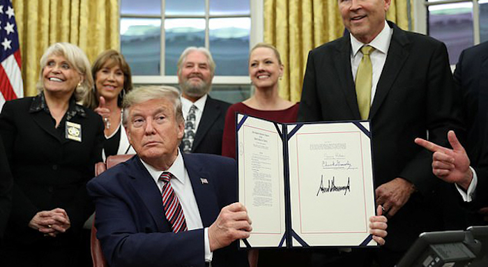 President Donald Trump signed a landmark bill Monday that criminalizes animal abuse and the creation and distribution of pictures and videos of animal torture.