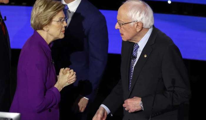 Elizabeth Warren was caught on a hot mic seconds after Tuesday's Democrat debate accusing Bernie Sanders of calling her a liar.